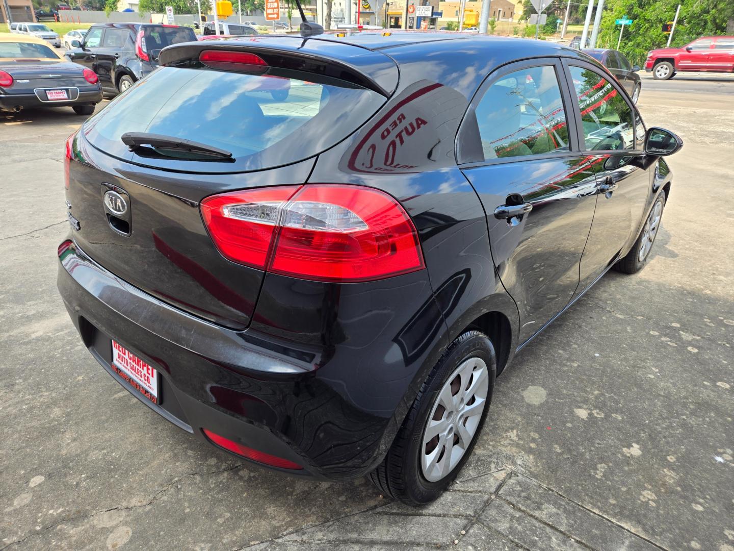 2012 Black Kia Rio (KNADM5A30C6) with an 1.6L I4 F DOHC 16V engine, Automatic transmission, located at 503 West Court, Seguin, TX, 78155, (830) 379-3373, 29.568621, -97.969803 - Photo#2